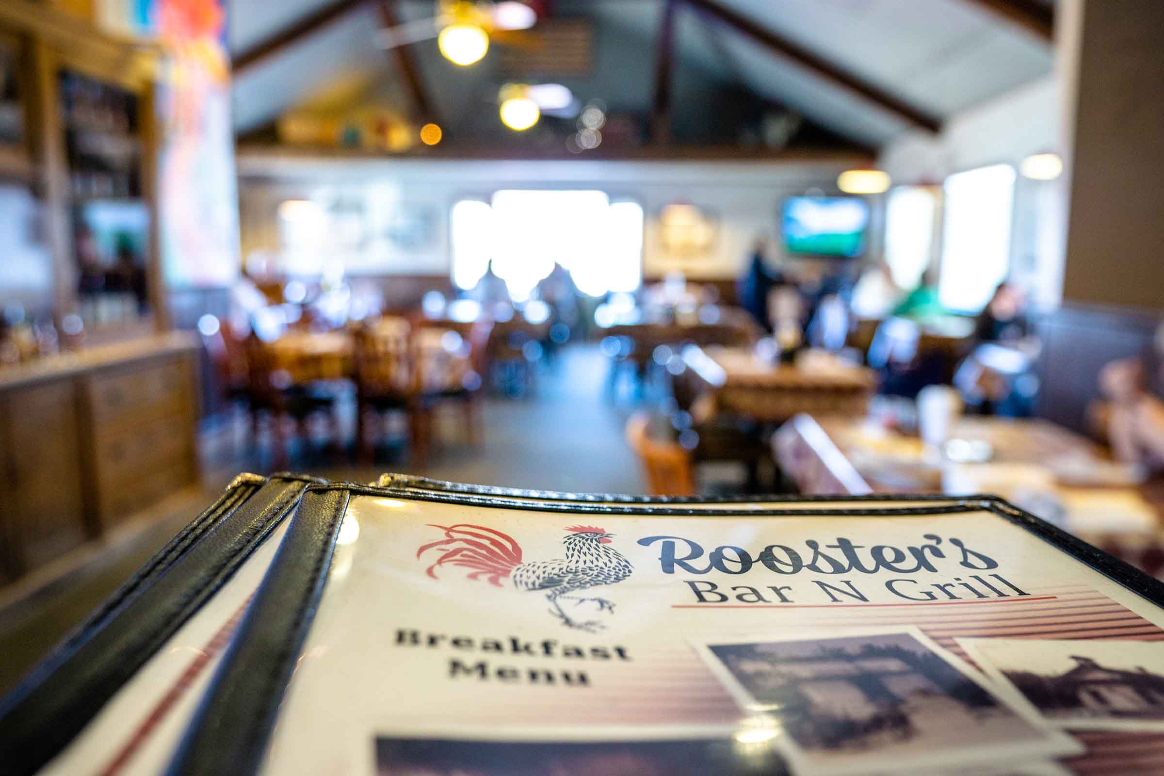 Interior of Roosters Barn and Grill with menu